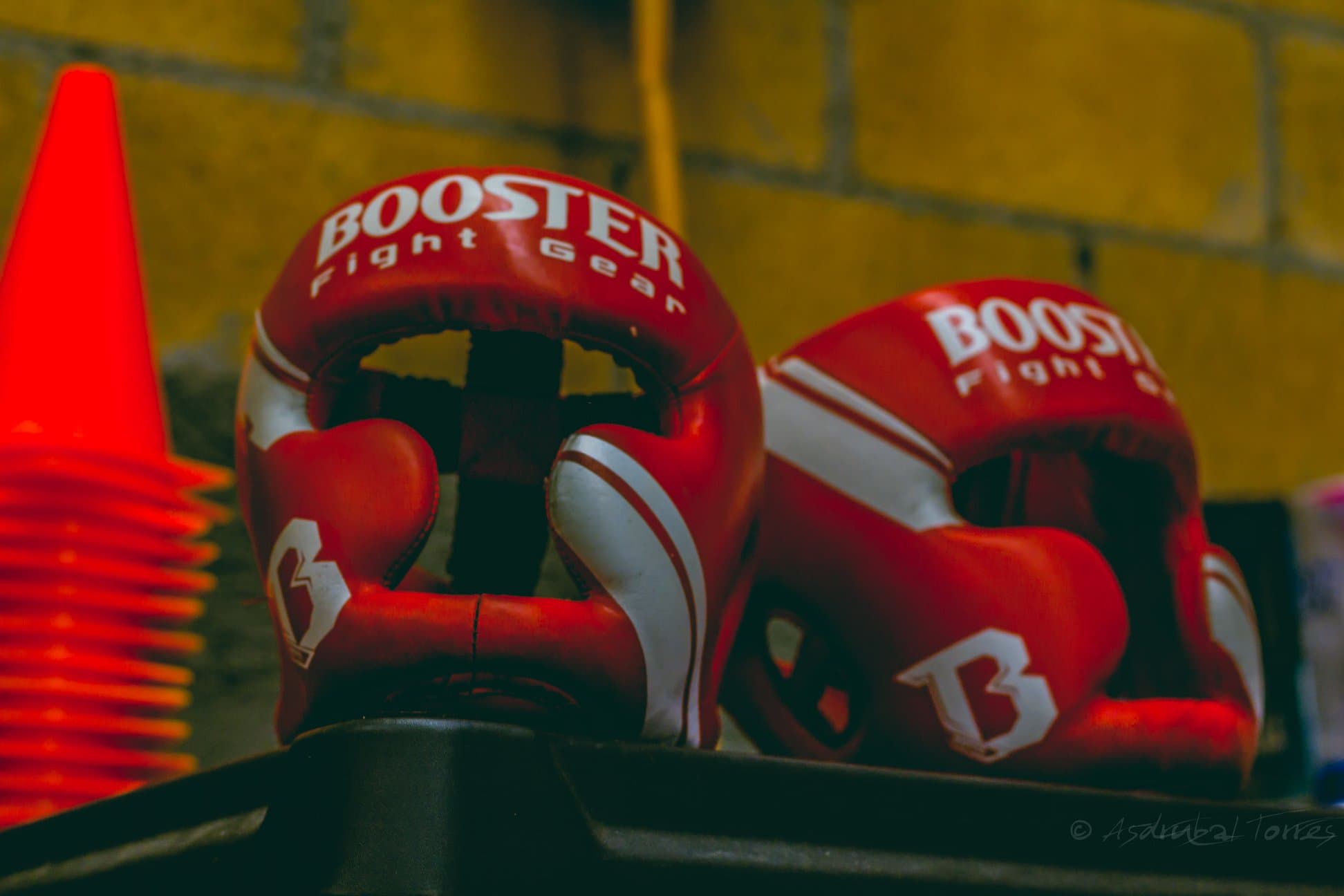 Professional Muay Thai and Boxing protective gear at The Union Gym, including Booster headgear and training equipment for safe sparring
